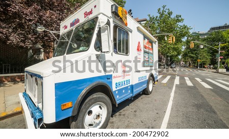NEW YORK - JUNE 16: ice cream truck on June 16, 2014 in New York. Ice cream trucks can drive around any of New York's five boroughs and serve cold refreshments in the summer months.