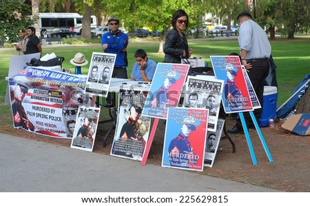 SACRAMENTO, CALIFORNIA - October 22: Protesters gather at the State Capital Building to demonstrate against police brutality in Sacramento, California on October 22, 2014