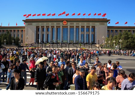 BEIJING-OCT 2: Visitors crowd Tiananmen area  on Oct 2, 2013 in Beijing, China. The National Day on October 1st marked the 64st anniversary of the founding of the People\'s Republic of China.