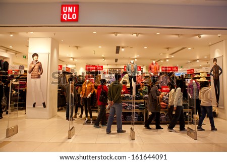 BEIJING-NOV 3: Shoppers at an Uniqlo store on Nov3,2013 in Beijing, China.  Fast Retailing Co., which operates the Uniqlo chain, posted record net sales of Â¥1.143 trillion in the last business year