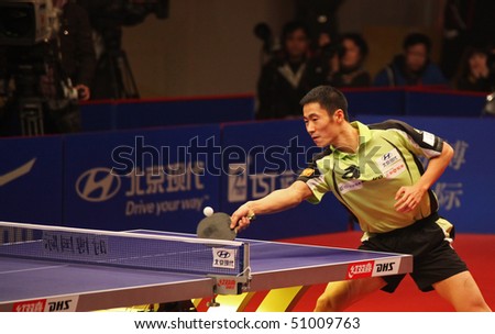BEIJING - APRIL 15: Wang Liqin (CHN) during match against Vladimir Samsonov (BLR) at the HYUNDAI Asia-Europe All Stars Series event day2 on April 15, 2010 in Beijing, China.