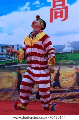 BEIJING-FEB 4: A clown performs on stage during the Spring Festival Temple Fair at Ditan Park on Feb 4, 2011 in Beijing, China, on the second day of the Chinese New Year, the year of the rabbit