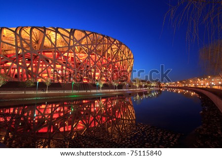 BEIJING - MARCH 26: Beijing National Stadium, also known as the Bird\'s Nest, at dusk on March 26, 2011 in Beijing, China. The 2015 World Championships in Athletics will take place at this famous venue