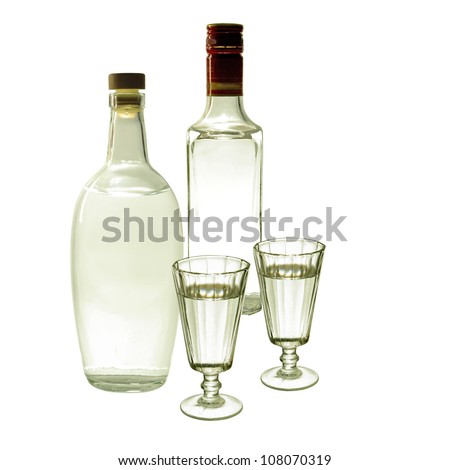 Vodka and Gin Bottles and Glasses . Isolated on white background