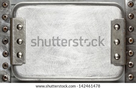 Industrial metal plate background with rivets