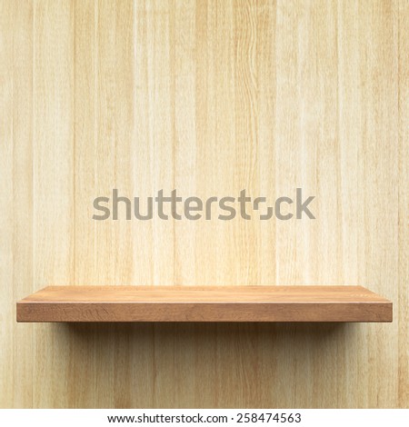 Empty shelf on a wooden wall