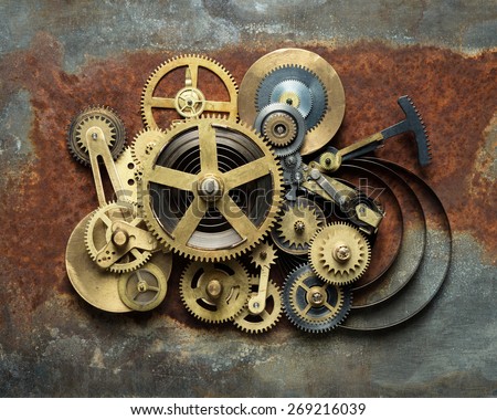 Metal collage of clockwork on rusty background