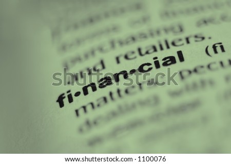 Extreme macro or close up of the word FINANCIAL. Very shallow depth of field is intentional and shows only the word financial in focus.