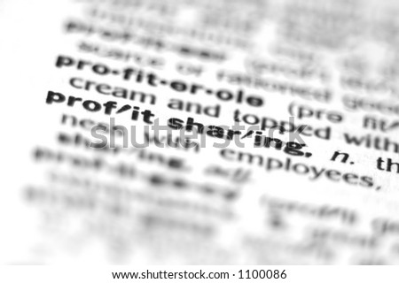 Extreme macro or close up of the word PROFIT SHARING. Very shallow depth of field is intentional and shows only the word profit sharing in focus.