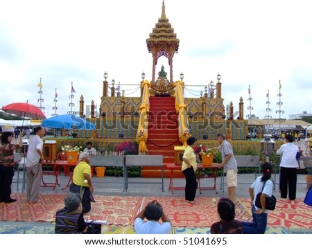 BANGKOK, THAILAND - APRIL 03: Thai people worship a Buddhist shrine at a Buddhist festival in Suan Luang. April 03 2007 in Bangkok.