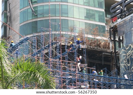 BANGKOK, THAILAND - JUNE 25: Central world shopping center being rebuilt after red shirt protesters set it on fire on June 25, 2010 in Bangkok.