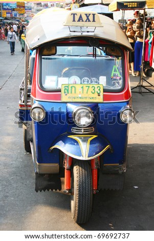 BANGKOK - JANUARY 19: Thai Tuk Tuk taxi on Khaosarn road on January 19, 2011 in Bangkok, Thailand.