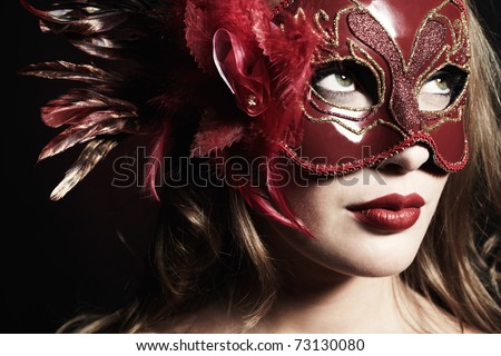Beautiful Young Woman In A Red Mysterious Venetian Mask Stock Photo ...