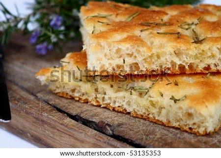 Similar – Foto Bild Hausgemachtes Rosmarin-Focaccia-Brot, Ansicht von oben, Nahaufnahme.