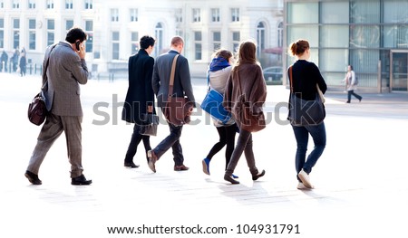 Similar – Image, Stock Photo Pedestrians against the light
