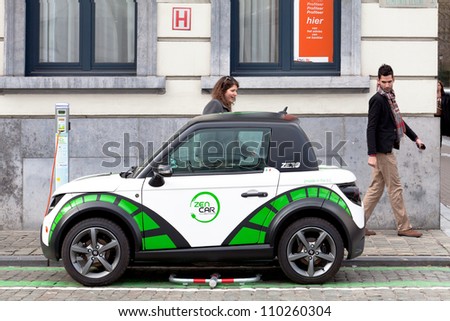 BRUSSELS - MARCH 14: Zen Car Europe\'s first electric car to rent on the square opposite the Luxembourg European Parliament March 14, 2012 in Brussels, Belgium