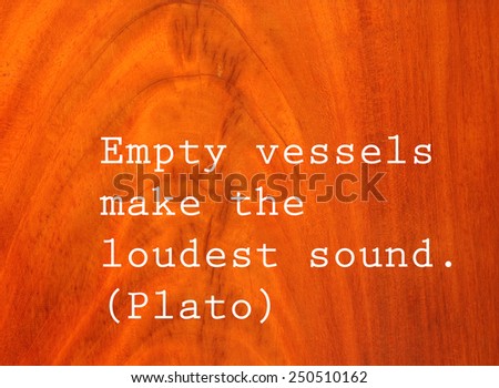 Empty vessels make the loudest sound, text by Plato on antique cherry wood background