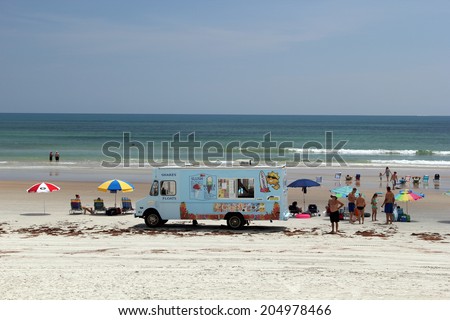 Daytona Beach, Florida, US- June 8: Promotion car selling ice cream on the beach, Daytona Beach on June 8 2014