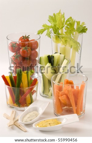 Crudites salad. Assorted vegetables sticks and dips. Selective focus.