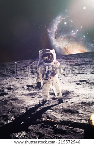 Astronaut walking on moon with galaxy background. Elements of this image furnished by NASA