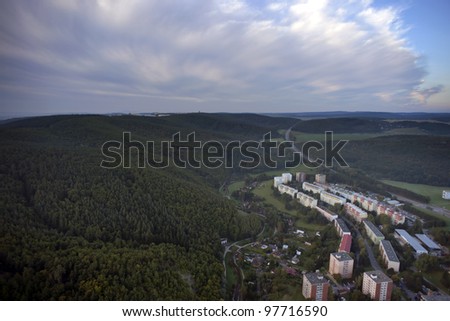 Aerial city view with crossroads, roads, houses, parks, parking lots, bridges, Brno, Czech Republic