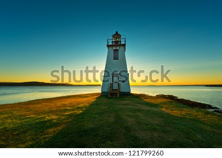 Lighthouse during sunrise in the early morning with beautiful colors