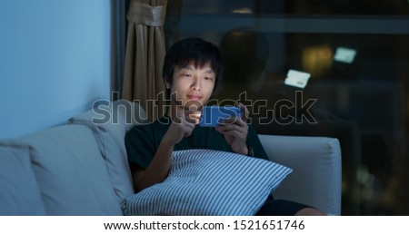 Similar – Image, Stock Photo Focused boy watching films on tablet