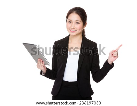 Businesswoman use of tablet and finger point up
