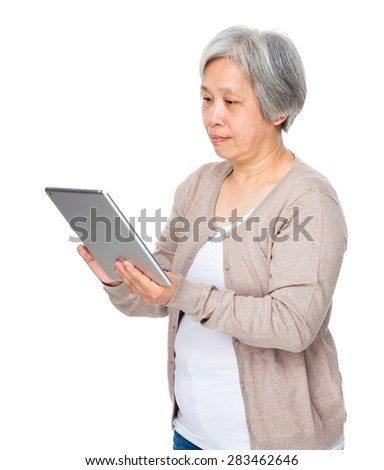 Elderly woman use of tablet