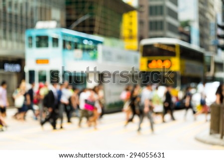 Blur view of Crosswalk and pedestrian at street in hong kong