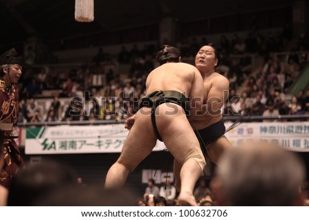 TOKYO - APRIL 7: Unidentified Sumo wrestlers in the Fujisawa tournament in Tokyo, Japan on April 7, 2012. Even though the sport is mostly dominated by foreigners it is still Japan\'s national sport.