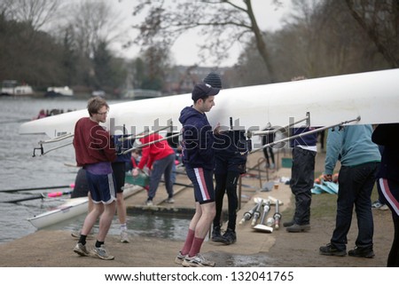OXFORD - MAR 8: Oxford university students preparing a boat during Torpids races on March 8, 2013. Torpids are one of annually three races with more than 1,200 participants.