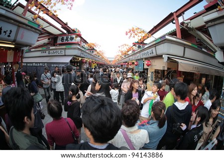 TOKYO, JAPAN - AUGUST 20: Fish-eye view of the arcade at Senso-ji, the symbol of Asakusa and one of the most famed temples in all of Japan on August 20, 2011 in Tokyo, Japan.