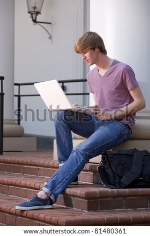 Male College Student with Laptop Computer