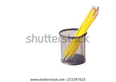 lead pencils in metal pot on a white background
