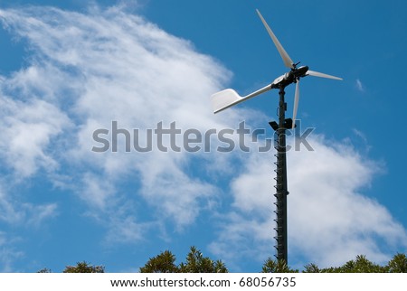 Privately owned Windmill supplying power for three homes in the bush in New Zealand