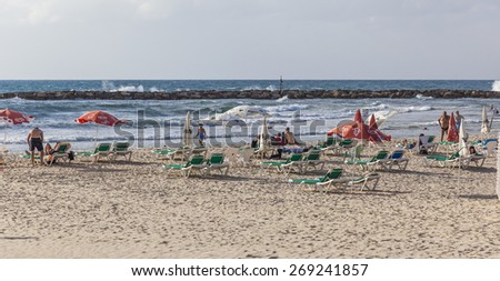 TEL AVIV, ISRAEL - OCTOBER 19, 2014: Banana Beach. Despite hot weather, October in Israel considered a shoulder season, so beaches are not packed too much.