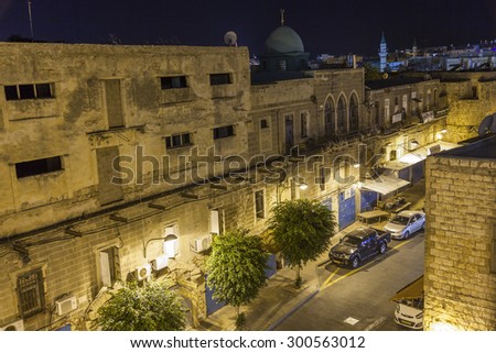 AKKO, ISRAEL - OCTOBER 22, 2014: Streets of ancient city of Akko at night. The place changed very little in several hundreds of years.