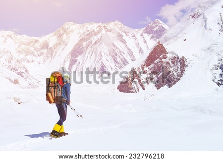 A lonely climber reaching the summit