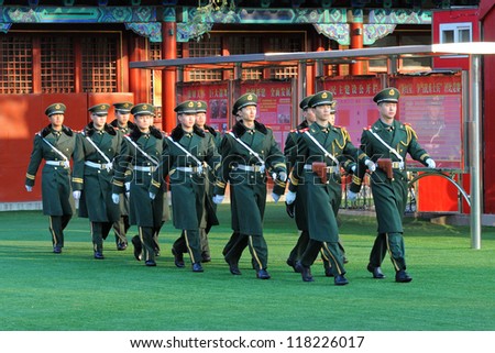 BEIJING - NOV 6: Soldiers patrol in Tiananmen area ahead of China\'s 18th National Congress on November 6, 2012 in Beijing, China. This year security is extra tight because of new leadership transition