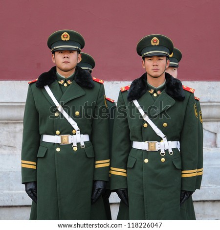 BEIJING - NOV 6: Soldiers stand guard in Tiananmen area ahead of China\'s 18th National Congress on November 6, 2012 in Beijing, China.This year security is extra tight because of leadership transition