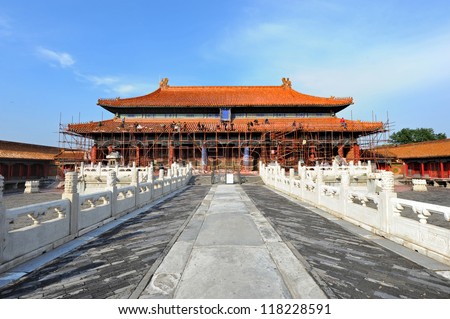 BEIJING - NOV 6: Chinese workers perform restoration work in the Forbidden City on November 6, 2012 in Beijing, China. The restoration is part of a sixteen-year project costing 250 million US dollars.