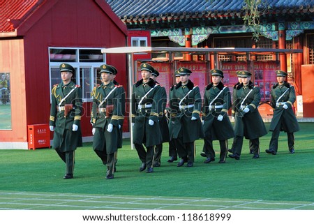 BEIJING - NOV 6: Soldiers patrol in Tiananmen area ahead of China's 18th National Congress on November 6, 2012 in Beijing, China. This year security is extra tight because of new leadership transition