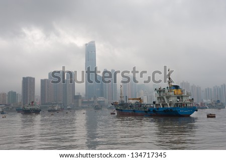HONG KONG - APRIL 5: Boats near the port of Hong Kong on April 5, 2013. It is one of the busiest ports in the world, in the categories of shipping movements, cargo handled and passengers carried.