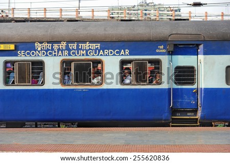 CALCUTTA - MARCH 27: passengers on board a Indian Railways train on March 27, 2014 in Calcutta, India. Indian Railways carried 8.4 billion passengers annually or more than 23 million passengers daily.