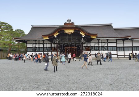 KYOTO - APRIL 7: tourists visit the Imperial Palace on April 7, 2015 in Kyoto, Japan. The palace was destroyed by fire but rebuilt in its original style; the present buildings date from 1855.
