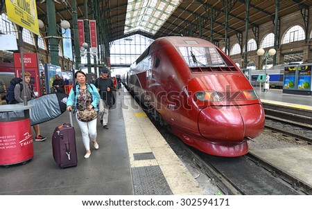 PARIS - JULY 19: French THALYS-train at Paris North Railway Station on July 19, 2015 in Paris, France. THALYS is France\'s flagship high speed train with possible maximum speed of over 400 km per hour.
