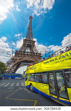 PARIS - JULY 20: tourists visit the Eiffel Tower on July 20, 2015 in Paris, France. In year 2014 more than 15 million tourists visited the city of Paris.