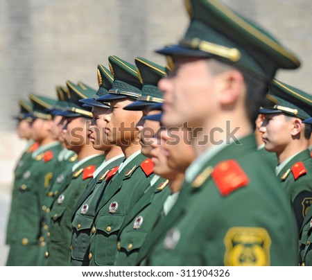 BEIJING - NOV 8: Chinese soldiers attend a parade at Tiananmen square on November 8, 2012 in Beijing, China. The Chinese army is the largest in the world, with a strength of around 2,285,000 soldiers.