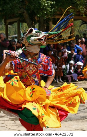 BHUTAN - APRIL 15: A dancer with colorful mask dances at a yearly festival called tsechu on April 15, 2008 in Bhutan